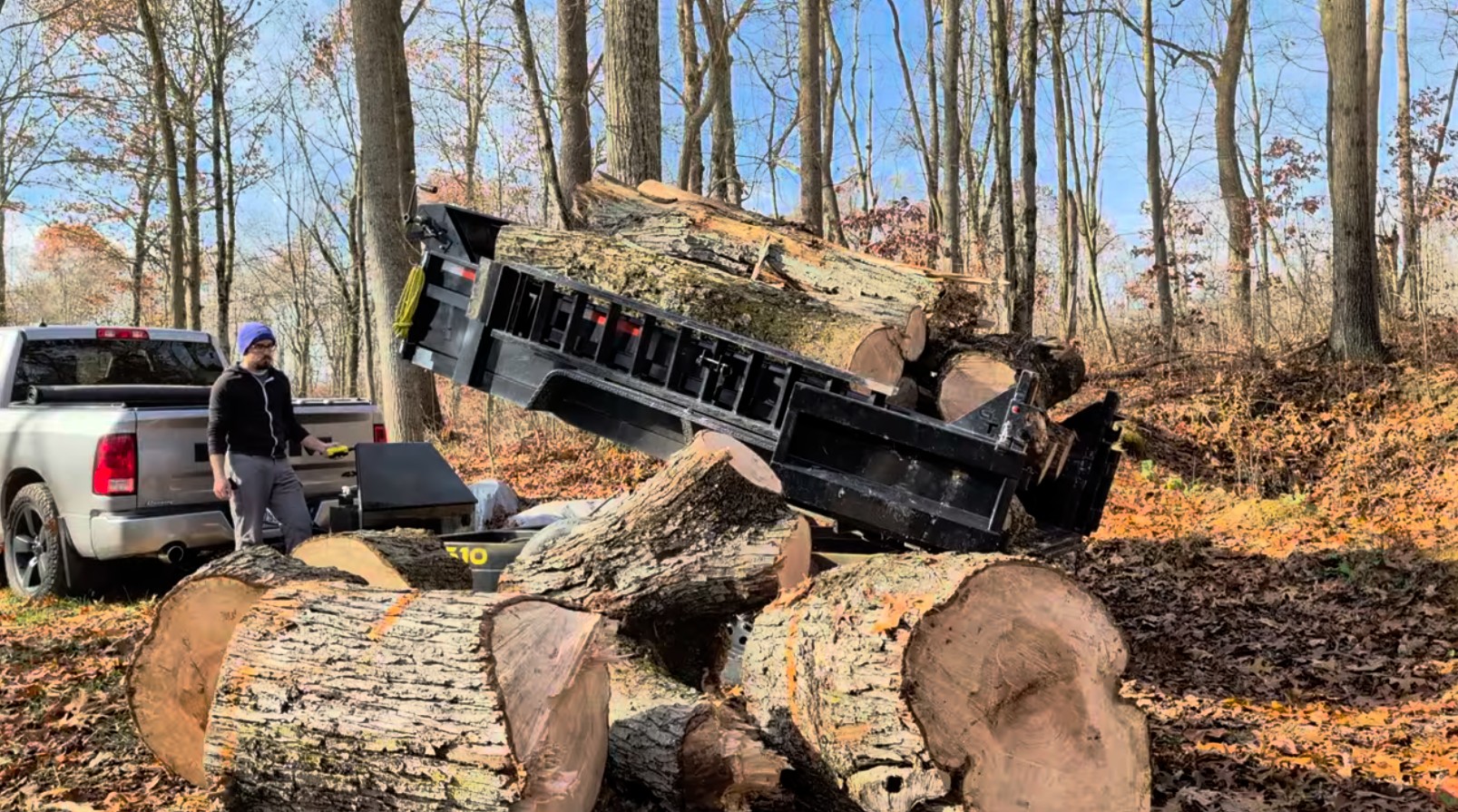 Hauling large logs out with a dump trailer